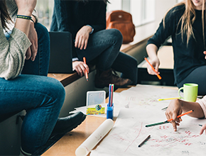 group of females having business meeting